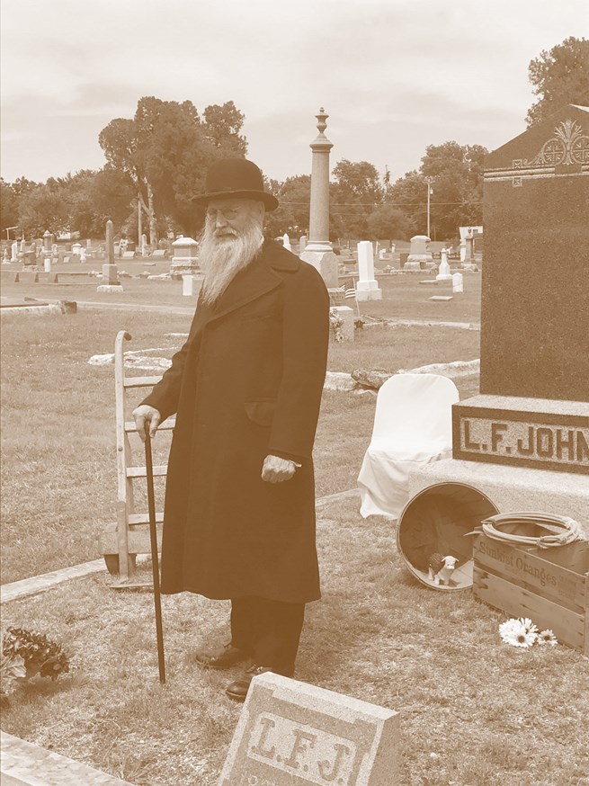 Roger Moon portraying L.F. Johnson