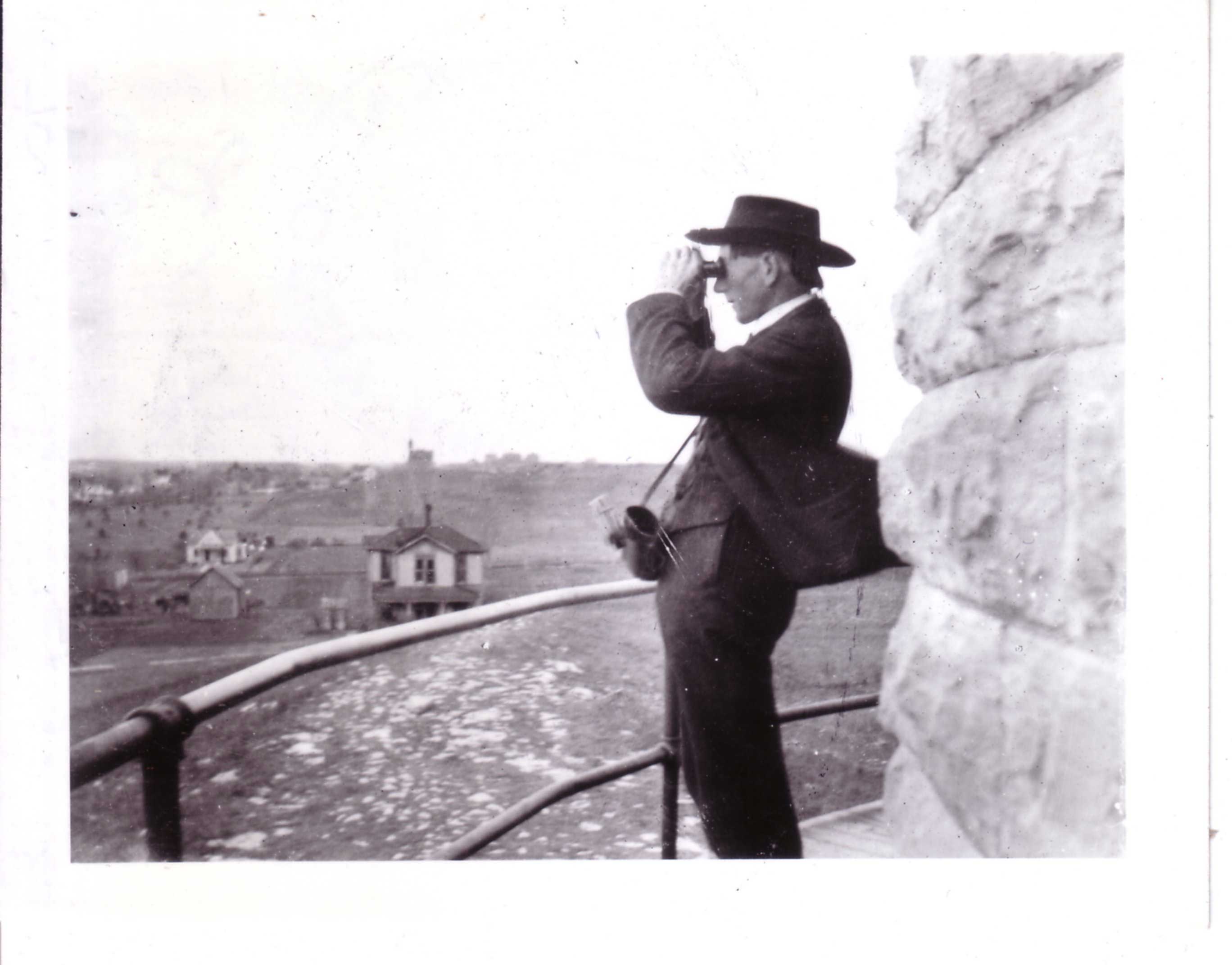 1910 Man on Observatory Deck