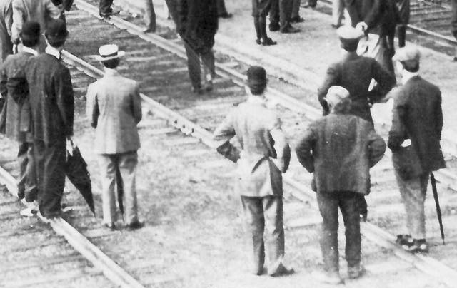 men standing in foreground