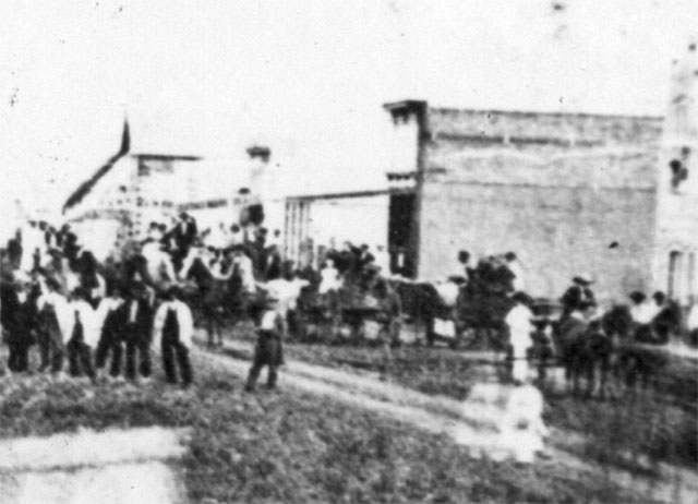 Far buildings on right.