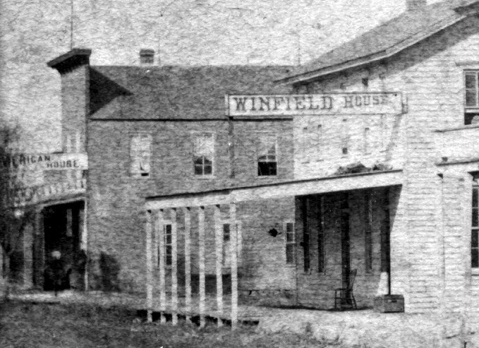 Buildings on left, American House and Winfield House.